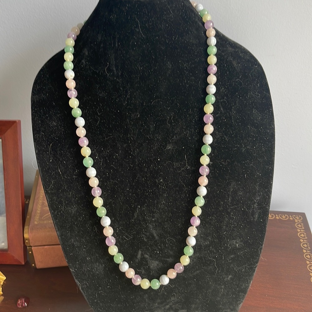 Beautiful multi colored jade necklace. No identification. Bought in Paris.
